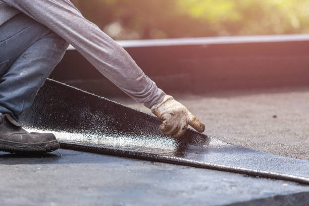 Professional Waterproofing technician working in Brownsville, KY
